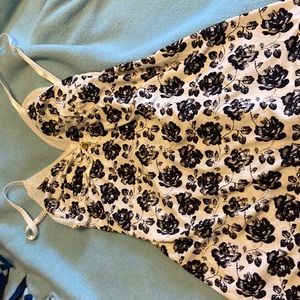 Women small black floral nighty.